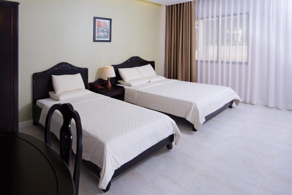 Royal Dragon Boutique Hotel Tan Binh Ho-Chi-Minh-Stadt Zimmer foto