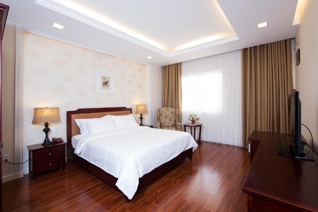 Royal Dragon Boutique Hotel Tan Binh Ho-Chi-Minh-Stadt Zimmer foto